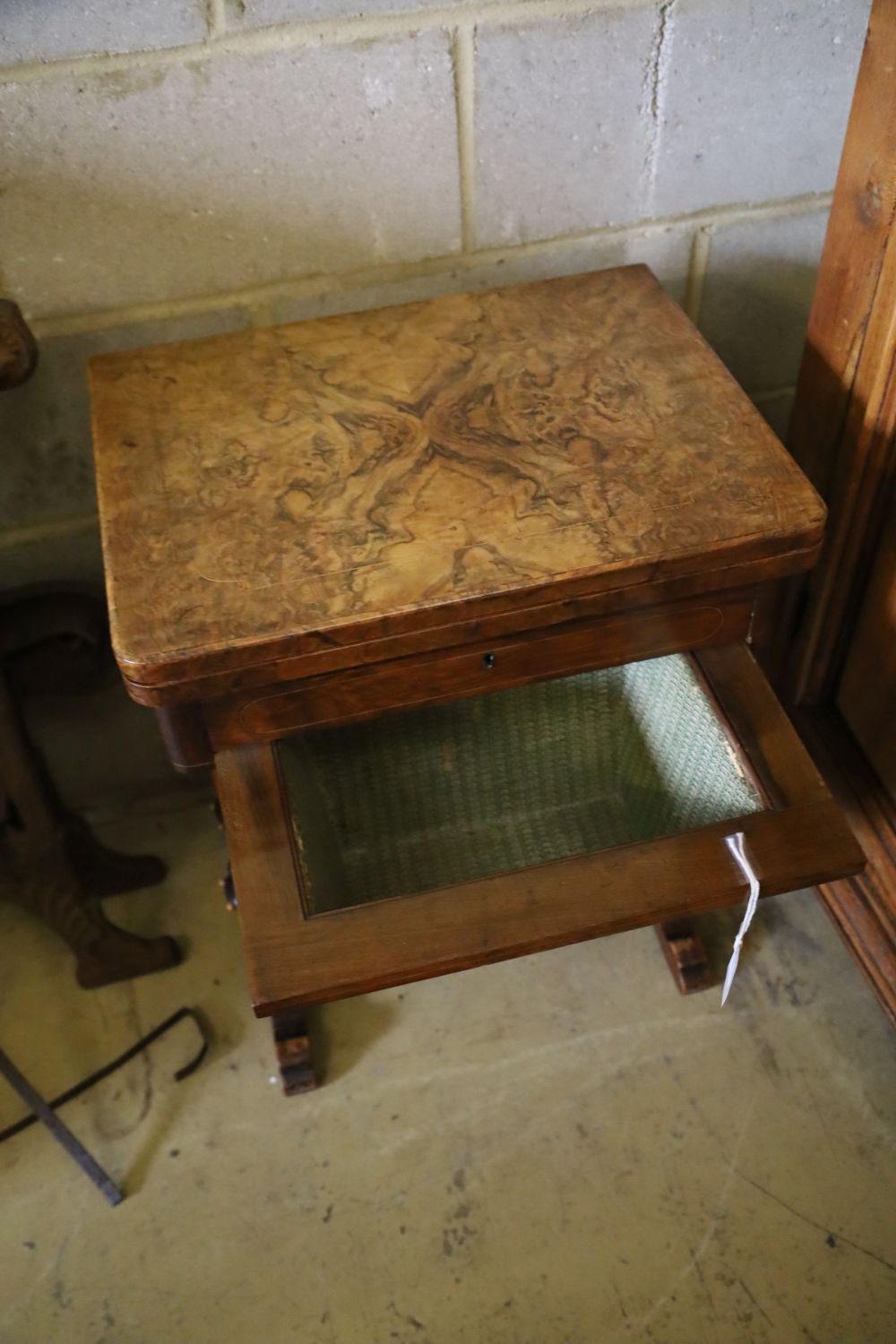 A Victorian burr walnut games / work table, width 53cm, depth 40cm, height 70cm